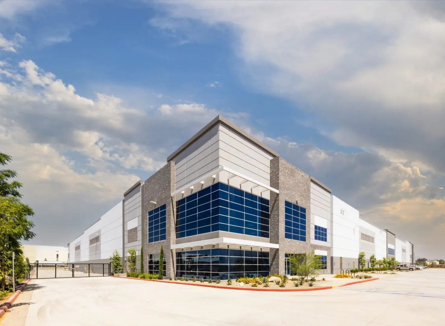 Modern industrial building with large windows.