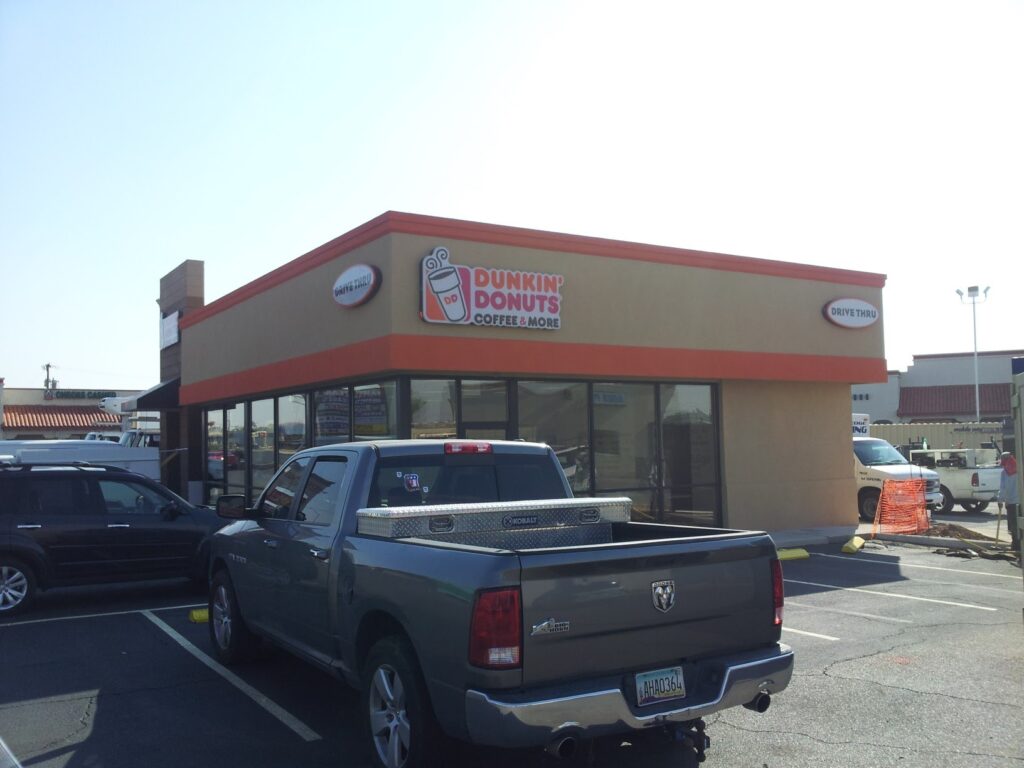 Dunkin' Donuts building with drive-thru access.
